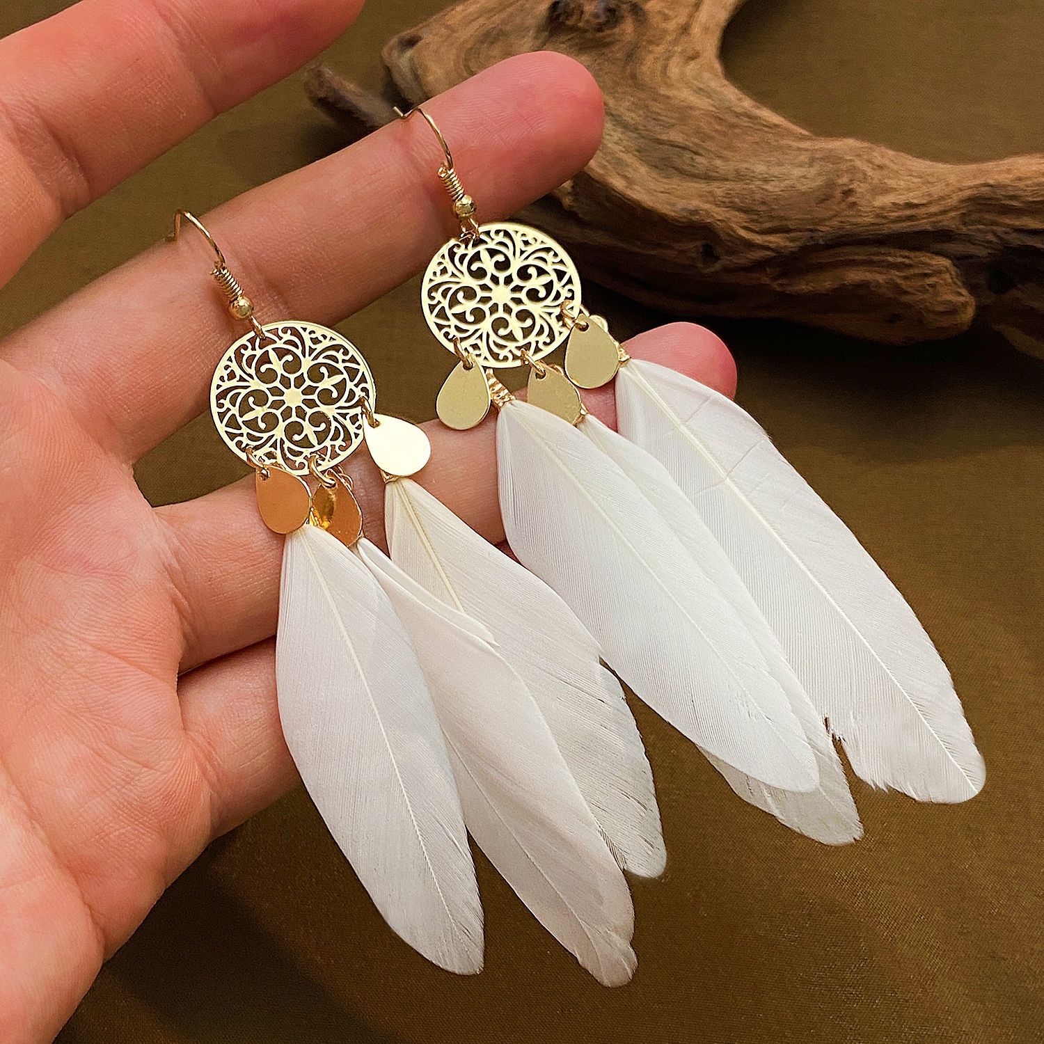 Anting-anting rumbai bulu mera - Ethnic Fashion Trend ulasan dan harga